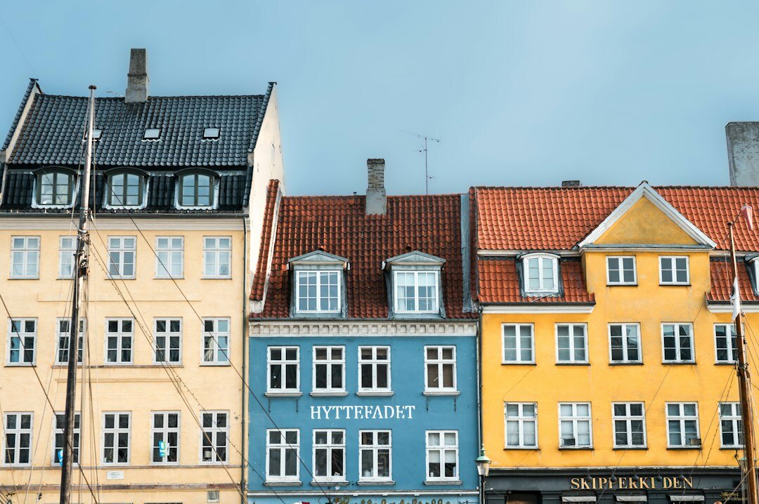 Colorful row houses along a Danish harbor street