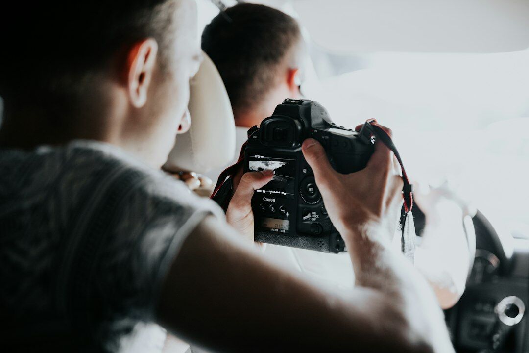 Team of documentary photographers reviewing photos together